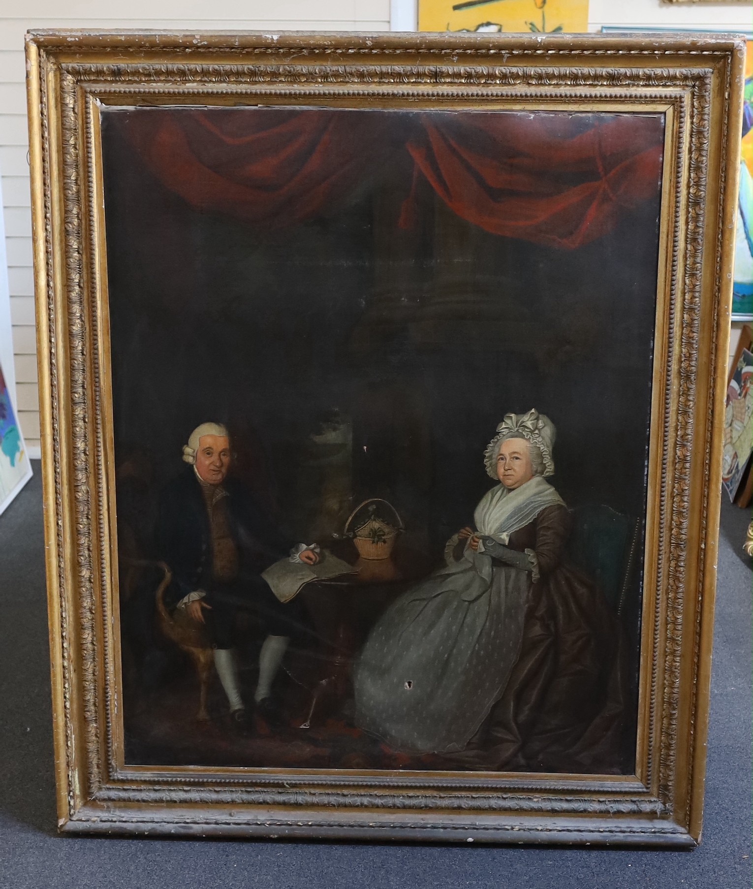 Late 18th Century English School, Full length portrait of Sir James Esdaile (1714-1793) and Elizabeth Pate, seated at table with columns, drapery, and a garden beyond, oil on canvas, 124 x 99cm